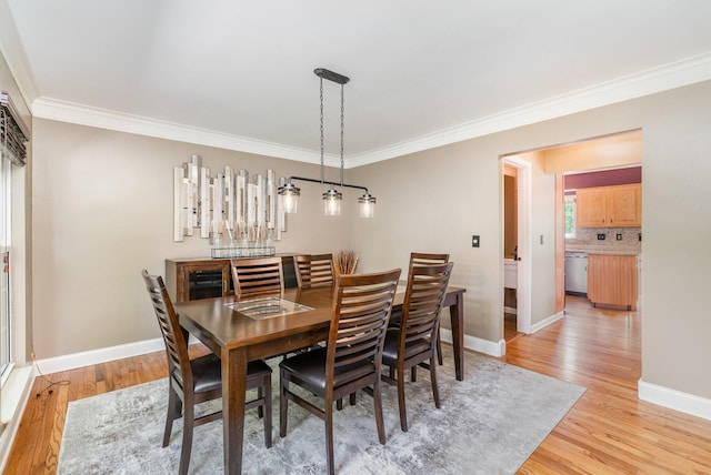 8202 Heatherwood Dr, Florence, KY 41042 - dining area with ornamental molding and light wood-type flooring
