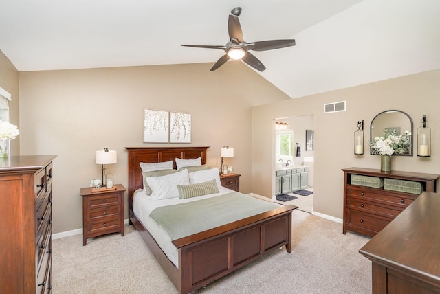 8202 Heatherwood Dr, Florence, KY 41042 - bedroom featuring light colored carpet, vaulted ceiling, ensuite bath, and a ceiling fan