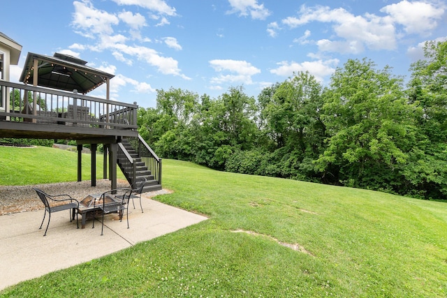 8202 Heatherwood Dr, Florence, KY 41042 - view of green lawn with stairs, a patio area, a deck, and a fire pit