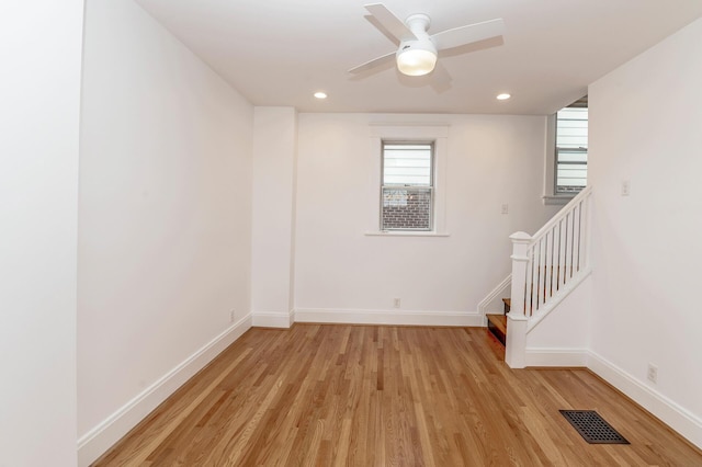 61 Biehl St, Newport, KY 41071 - spare room with light wood-style floors, ceiling fan, stairway, and recessed lighting