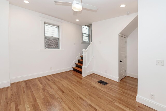 61 Biehl St, Newport, KY 41071 - empty room featuring light wood-style flooring, stairway, recessed lighting, a smoke detector, and ceiling fan