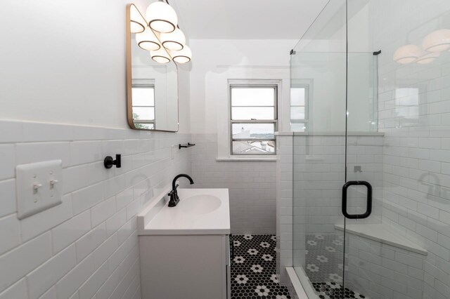 61 Biehl St, Newport, KY 41071 - full bath with a stall shower, vanity, tile walls, a wainscoted wall, and tile patterned flooring