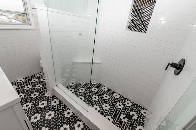 61 Biehl St, Newport, KY 41071 - full bath featuring tile walls, tile patterned flooring, and tiled shower