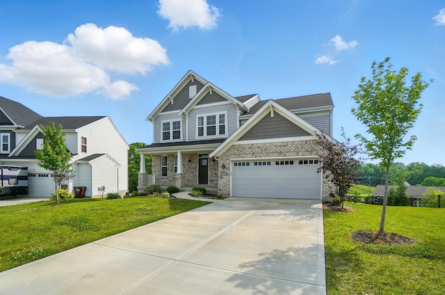 3226 Chloe Ct, Hebron, KY 41048 - craftsman-style house featuring a front yard, driveway, a porch, and a garage