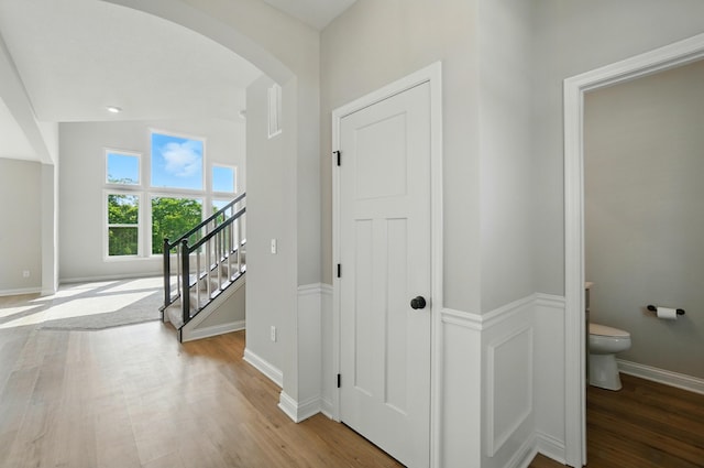 3226 Chloe Ct, Hebron, KY 41048 - corridor with arched walkways, wood finished floors, and stairs