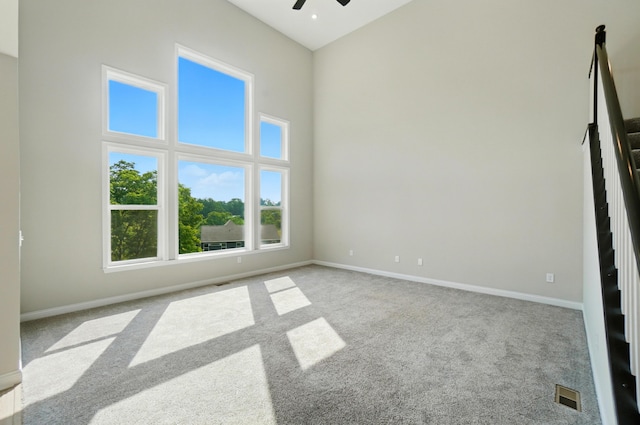 3226 Chloe Ct, Hebron, KY 41048 - spare room featuring carpet floors, ceiling fan, and a high ceiling