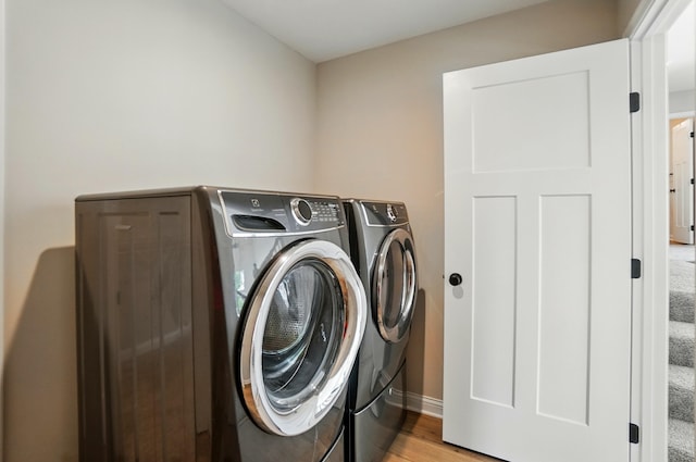 3226 Chloe Ct, Hebron, KY 41048 - laundry area with washer and clothes dryer and light wood-type flooring