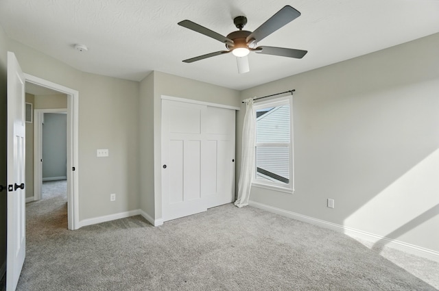 3226 Chloe Ct, Hebron, KY 41048 - unfurnished bedroom with carpet, a closet, and ceiling fan