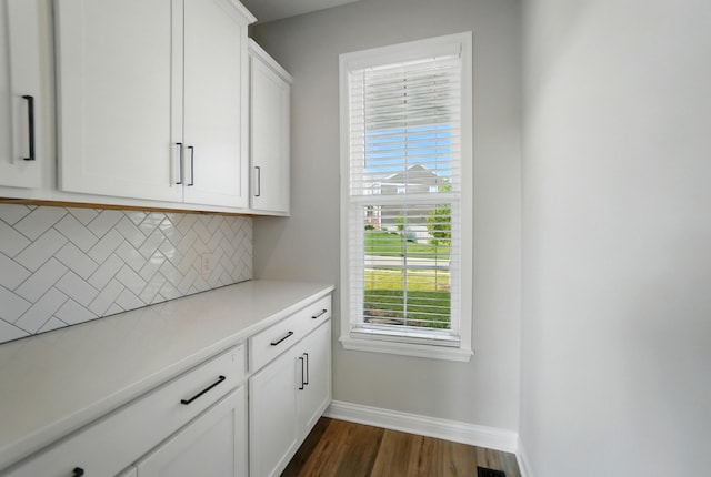 3226 Chloe Ct, Hebron, KY 41048 - kitchen with backsplash, dark wood-style floors, light countertops, and white cabinetry