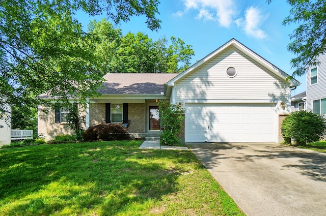 7424 Cumberland Cir, Florence, KY 41042 - ranch-style home with brick siding, a garage, concrete driveway, a front yard, and roof with shingles