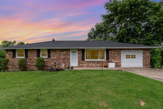 20 Blanche Ave, Williamstown, KY 41097 - ranch-style house with concrete driveway, a garage, a yard, and brick siding
