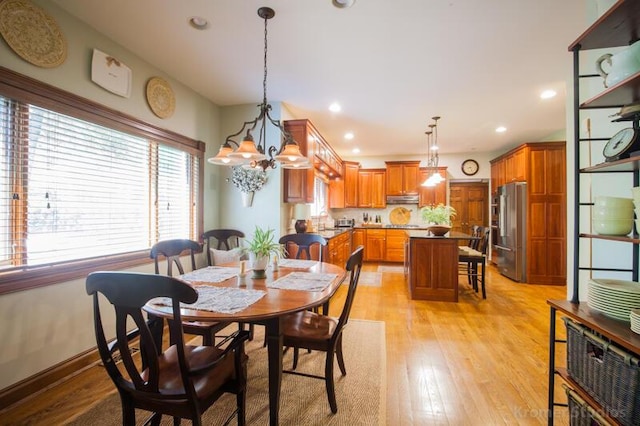 2507 Woodstone Way, Villa Hills, KY 41017 - dining space with light wood-style flooring, a chandelier, and recessed lighting