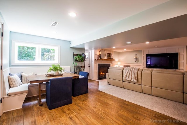 2507 Woodstone Way, Villa Hills, KY 41017 - living area with wood finished floors, a lit fireplace, and recessed lighting