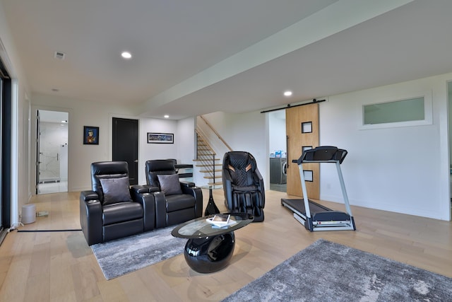 716 Western Ave, Covington, KY 41011 - workout room featuring a barn door, wood finished floors, and recessed lighting