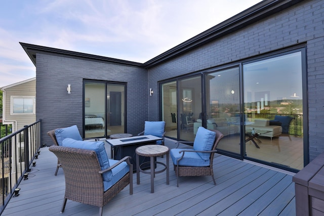 716 Western Ave, Covington, KY 41011 - wooden deck with an outdoor fire pit