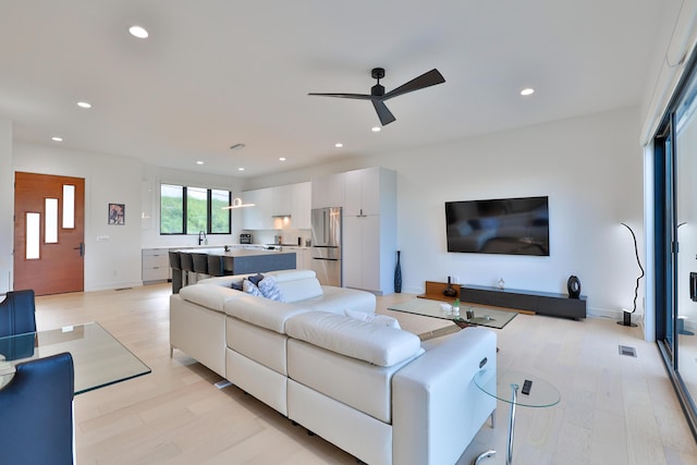 716 Western Ave, Covington, KY 41011 - living room featuring recessed lighting, a ceiling fan, and light wood finished floors