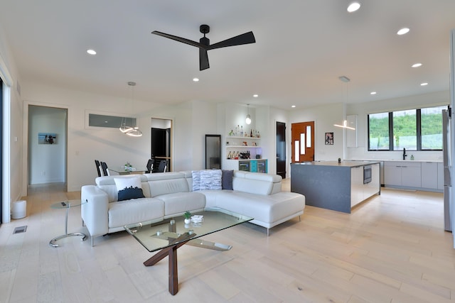 716 Western Ave, Covington, KY 41011 - living room featuring recessed lighting, a ceiling fan, and light wood finished floors