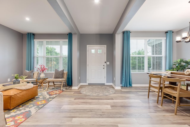 2320 Daybloom Ct, Hebron, KY 41048 - foyer entrance featuring light wood finished floors, a chandelier, and recessed lighting