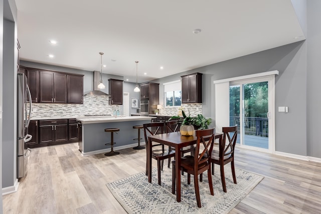 2320 Daybloom Ct, Hebron, KY 41048 - dining room featuring healthy amount of natural light, light wood-style flooring, and recessed lighting