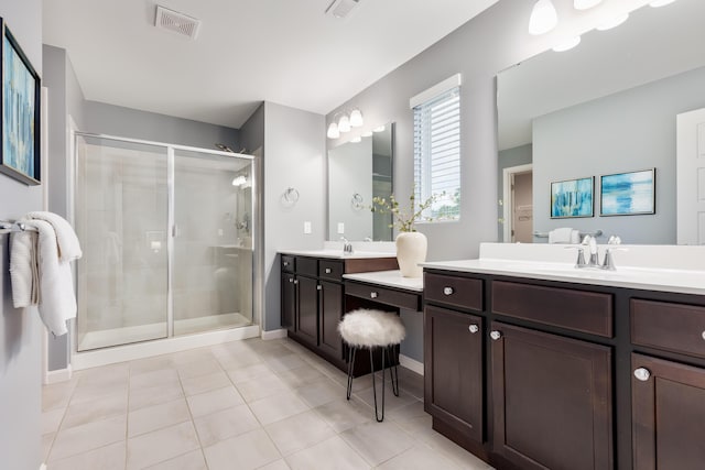 2320 Daybloom Ct, Hebron, KY 41048 - bathroom featuring a stall shower, tile patterned floors, and two vanities