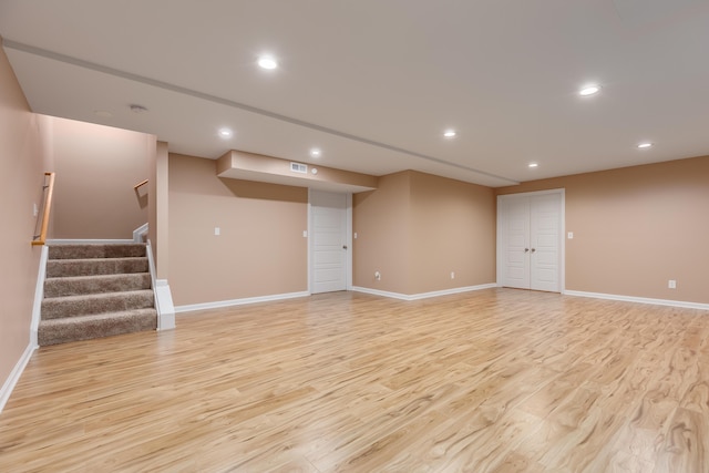 2320 Daybloom Ct, Hebron, KY 41048 - finished below grade area featuring light wood-style flooring, recessed lighting, and stairway