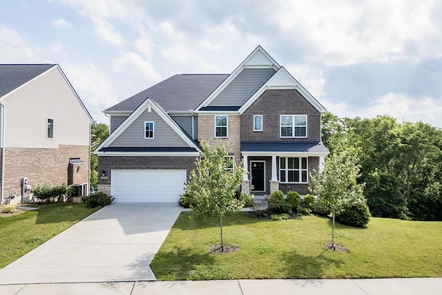 2320 Daybloom Ct, Hebron, KY 41048 - craftsman inspired home featuring concrete driveway, a front yard, a garage, and brick siding