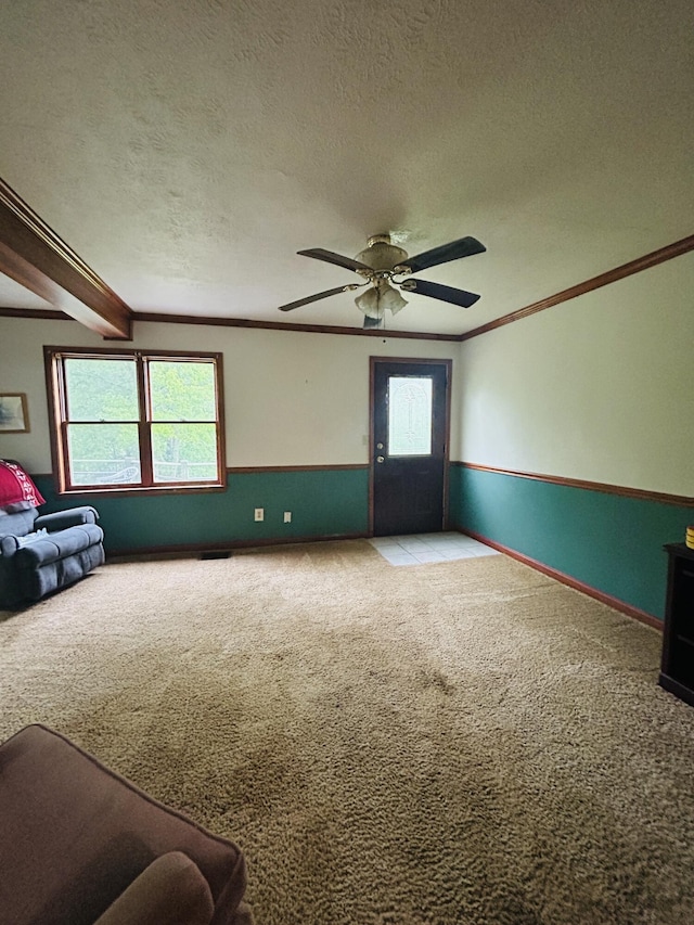 10061 Persimmon Grove Pike, Alexandria, KY 41001 - unfurnished room featuring carpet flooring, ornamental molding, a ceiling fan, and a textured ceiling