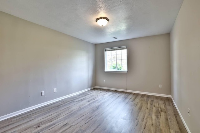 436 Marian Ln Unit 2, Florence, KY 41042 - unfurnished room with wood finished floors and a textured ceiling
