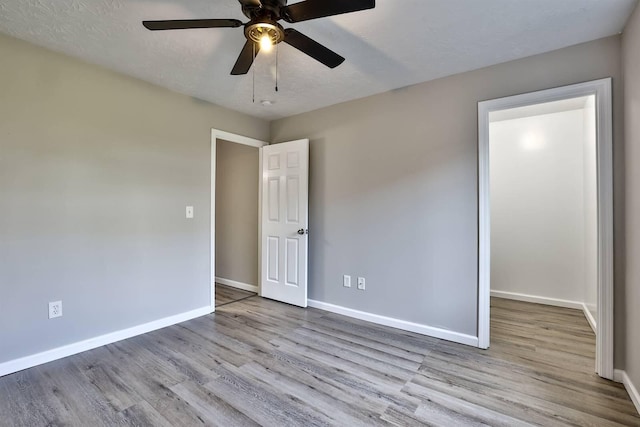 436 Marian Ln Unit 2, Florence, KY 41042 - unfurnished bedroom featuring wood finished floors and ceiling fan