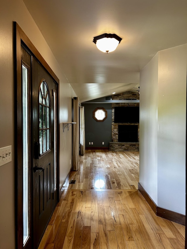 1756 Paxton Rd, Morning View, KY 41063 - entryway with vaulted ceiling, wood-type flooring, and a fireplace