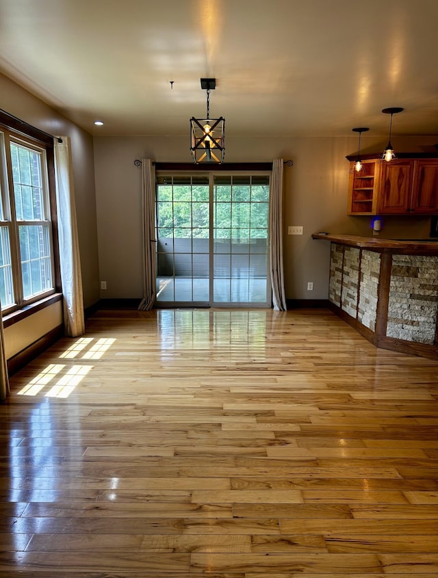1756 Paxton Rd, Morning View, KY 41063 - unfurnished dining area featuring plenty of natural light and light wood-style floors