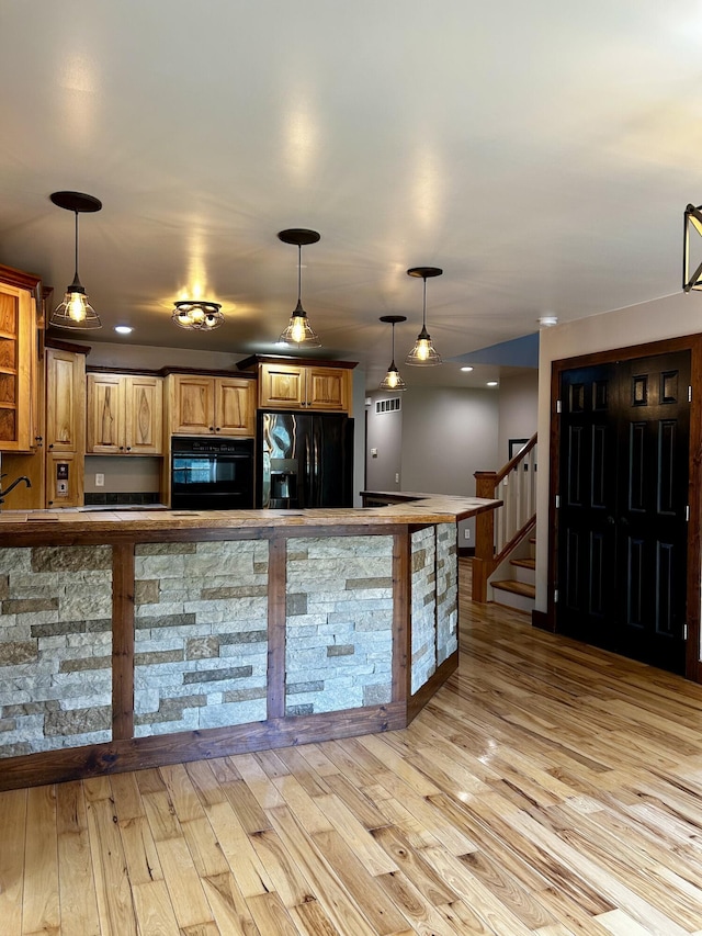 1756 Paxton Rd, Morning View, KY 41063 - kitchen with black appliances, light wood-style flooring, and decorative light fixtures