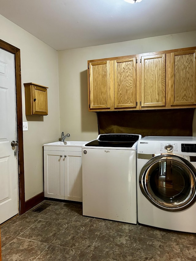 1756 Paxton Rd, Morning View, KY 41063 - laundry room featuring cabinet space, separate washer and dryer, and stone finish flooring