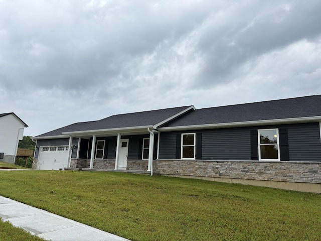 170 Saddlebrook Ln, Dry Ridge, KY 41035 - ranch-style house featuring an attached garage, a porch, a front yard, and stone siding