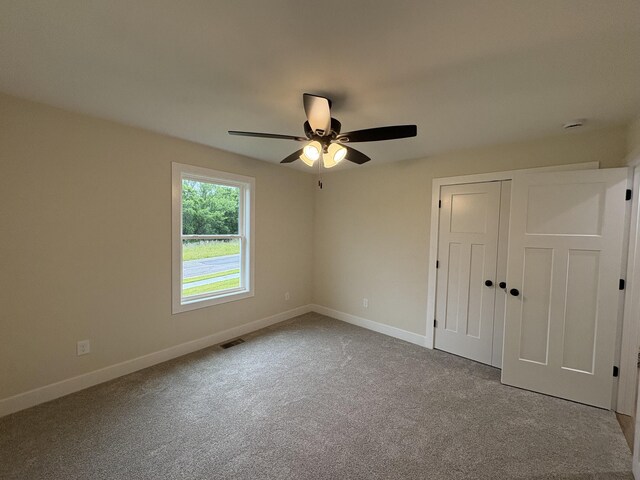 170 Saddlebrook Ln, Dry Ridge, KY 41035 - unfurnished bedroom featuring carpet flooring, a closet, and ceiling fan