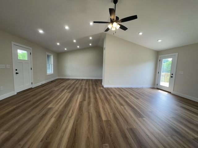170 Saddlebrook Ln, Dry Ridge, KY 41035 - unfurnished living room featuring healthy amount of natural light, dark wood-style flooring, ceiling fan, lofted ceiling, and recessed lighting