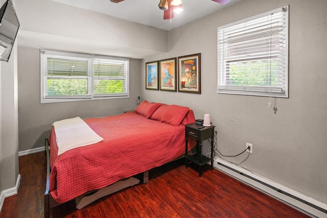 377 Linden Ave, Southgate, KY 41071 - bedroom featuring a baseboard radiator, wood finished floors, and a ceiling fan