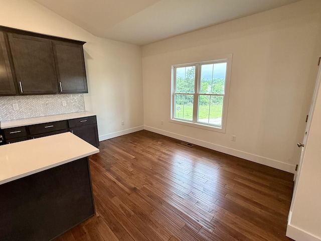 10448 Pleaasant Ridge Rd, Alexandria, KY 41001 - unfurnished dining area with dark wood-style floors and vaulted ceiling