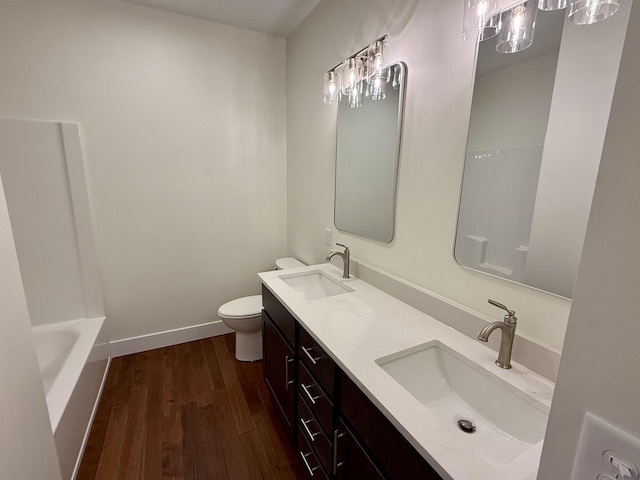 10448 Pleaasant Ridge Rd, Alexandria, KY 41001 - bathroom featuring wood finished floors and double vanity