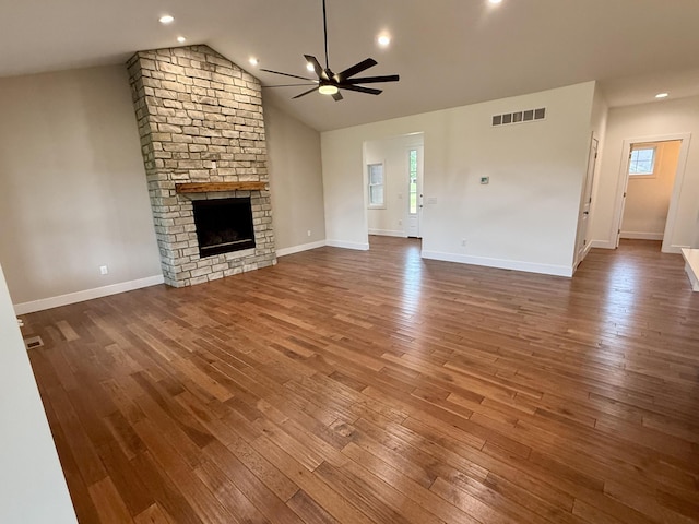 10448 Pleaasant Ridge Rd, Alexandria, KY 41001 - unfurnished living room with a ceiling fan, a fireplace, hardwood / wood-style flooring, plenty of natural light, and vaulted ceiling