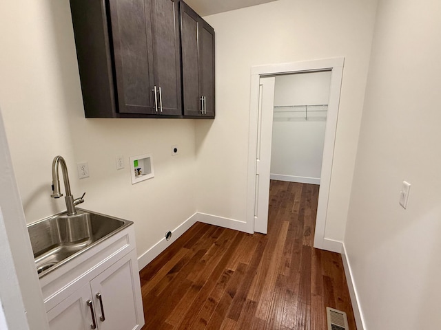 10448 Pleaasant Ridge Rd, Alexandria, KY 41001 - laundry room featuring electric dryer hookup, dark wood-style floors, hookup for a washing machine, and cabinet space