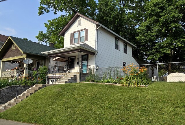 4336 Glenn Ave, Covington, KY 41015 - traditional-style home with a porch and stairway