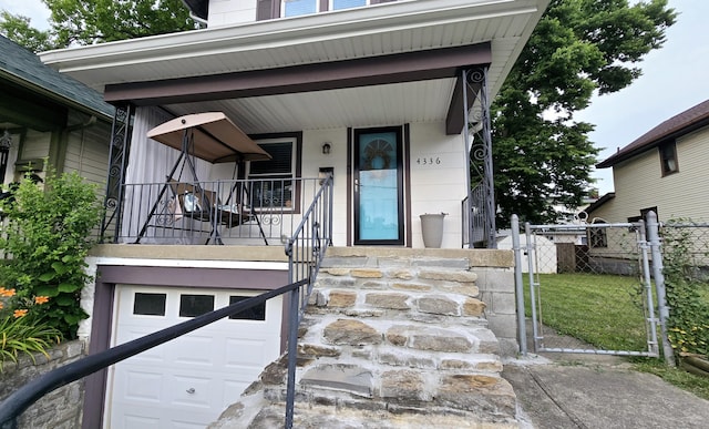 4336 Glenn Ave, Covington, KY 41015 - doorway to property with a garage and a porch