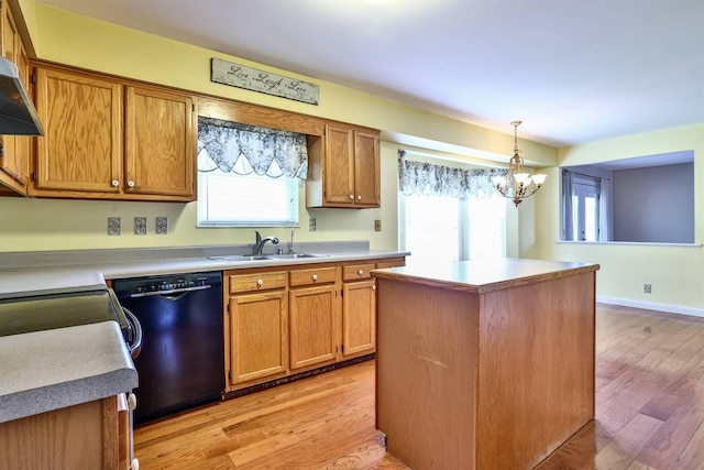 1906 Robins Run, Hebron, KY 41048 - kitchen with dishwasher, a chandelier, light wood finished floors, decorative light fixtures, and light countertops