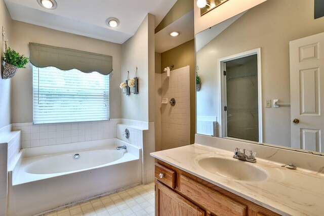 1906 Robins Run, Hebron, KY 41048 - bathroom with a garden tub, vanity, and a shower