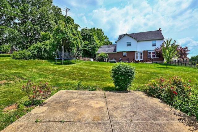 1906 Robins Run, Hebron, KY 41048 - view of yard featuring a trampoline and a patio area