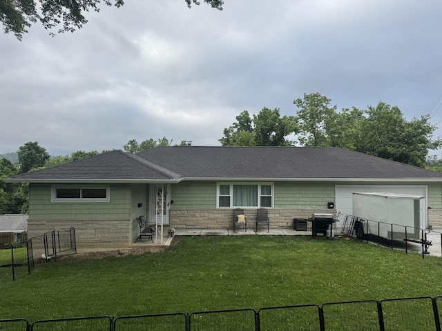 2706 Decoursey Ave, Covington, KY 41015 - rear view of property with stone siding, a patio, a garage, a shingled roof, and entry steps