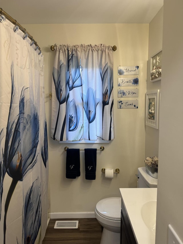 2706 Decoursey Ave, Covington, KY 41015 - bathroom featuring wood finished floors, vanity, and a shower with shower curtain