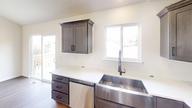 110 Liza Ln, Crittenden, KY 41030 - kitchen featuring dishwasher, wood finished floors, light countertops, and dark brown cabinets