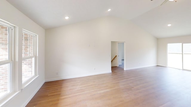 110 Liza Ln, Crittenden, KY 41030 - empty room with light wood finished floors, lofted ceiling, a ceiling fan, and recessed lighting